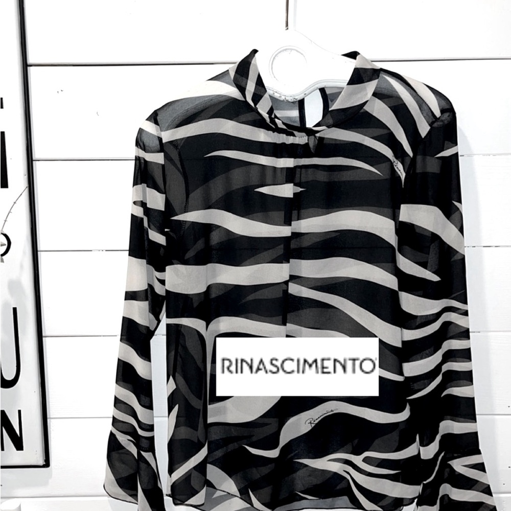 rinascimiento blouse size L .